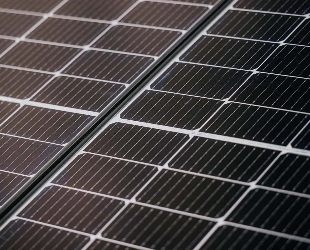 Close-up of solar panels with grid lines.